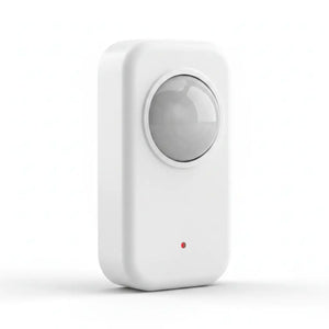 A white rectangular electronic device with rounded corners, featuring a circular transparent sensor window on the front and a small red indicator light near the bottom, shown on a clean white background.