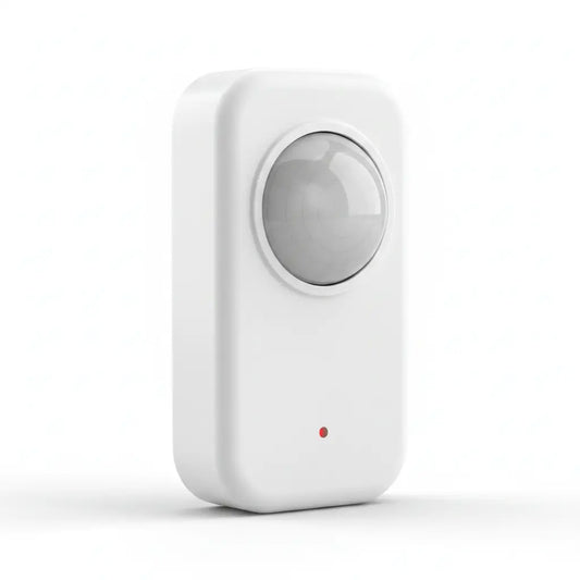 A white rectangular electronic device with rounded corners, featuring a circular transparent sensor window on the front and a small red indicator light near the bottom, shown on a clean white background.