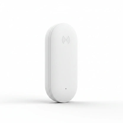 A white oval-shaped wireless sensor or tracker device with a subtle gray wireless signal icon and a small indicator dot on its front, set against a clean white background.